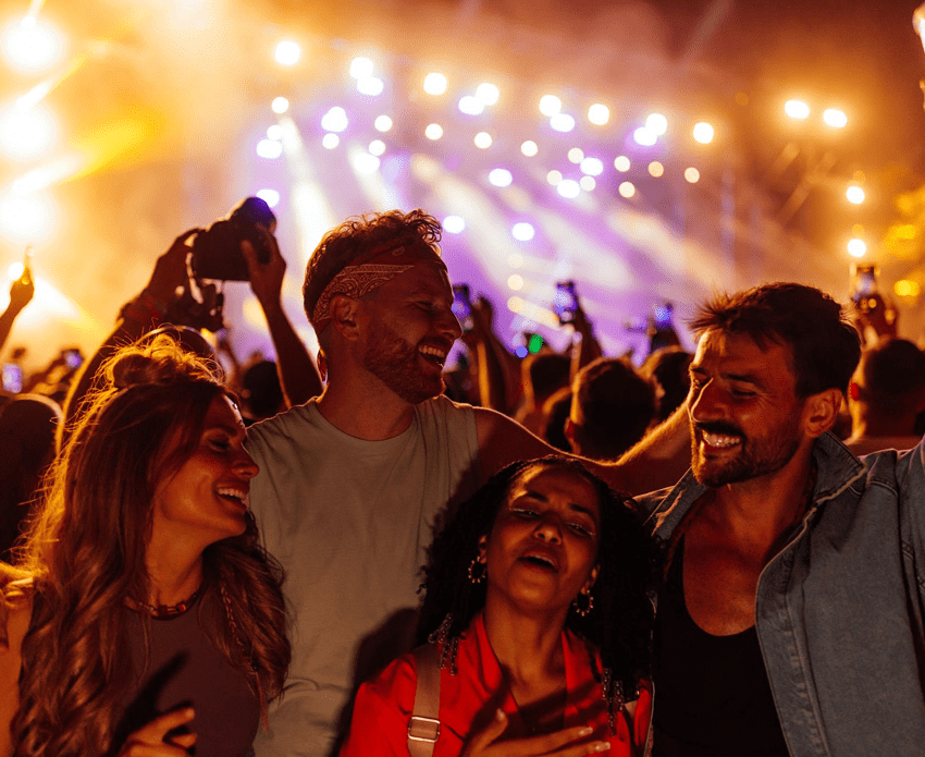 Friends enjoying a vibrant music concert.