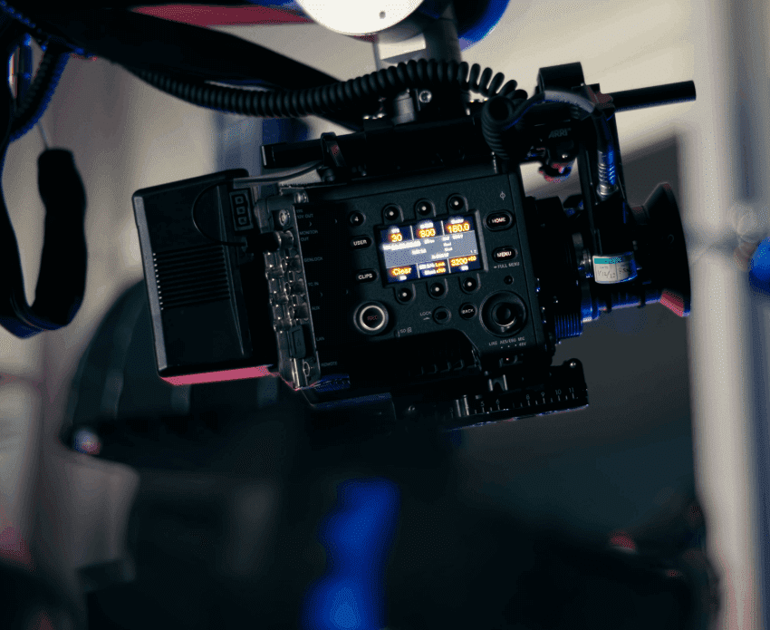 Professional video camera with digital display screen.