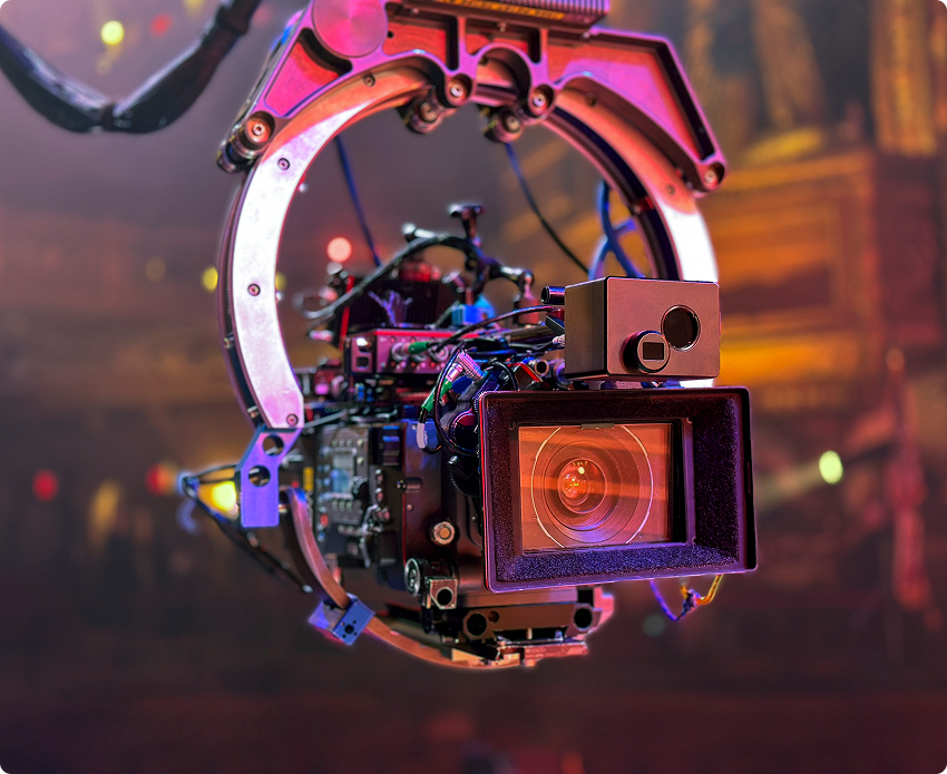 Close-up of a professional video camera setup.